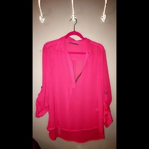 Jennifer Lopez pink blouse.